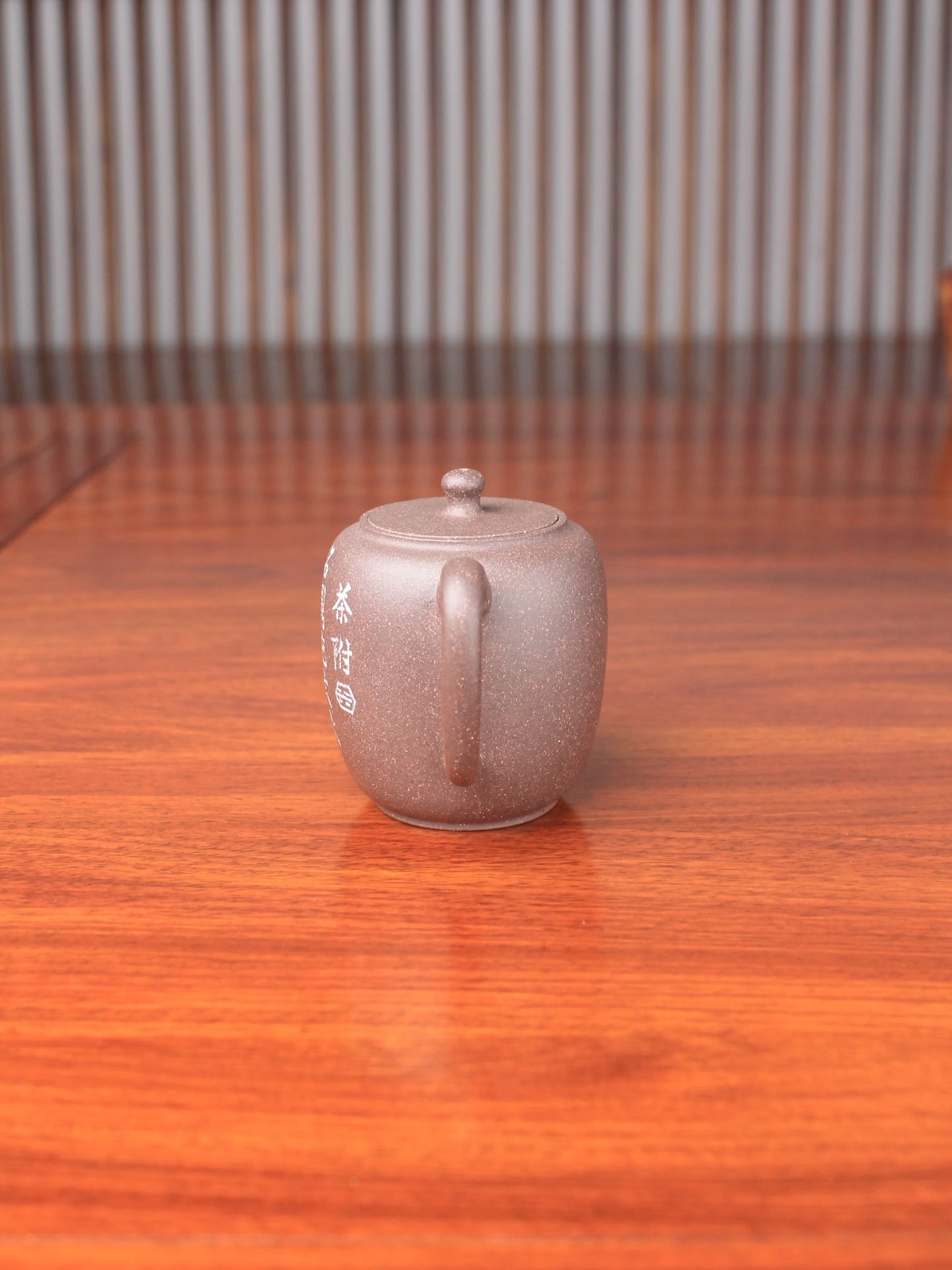handmade yixing teapot namedda bin lian zi on the table side view