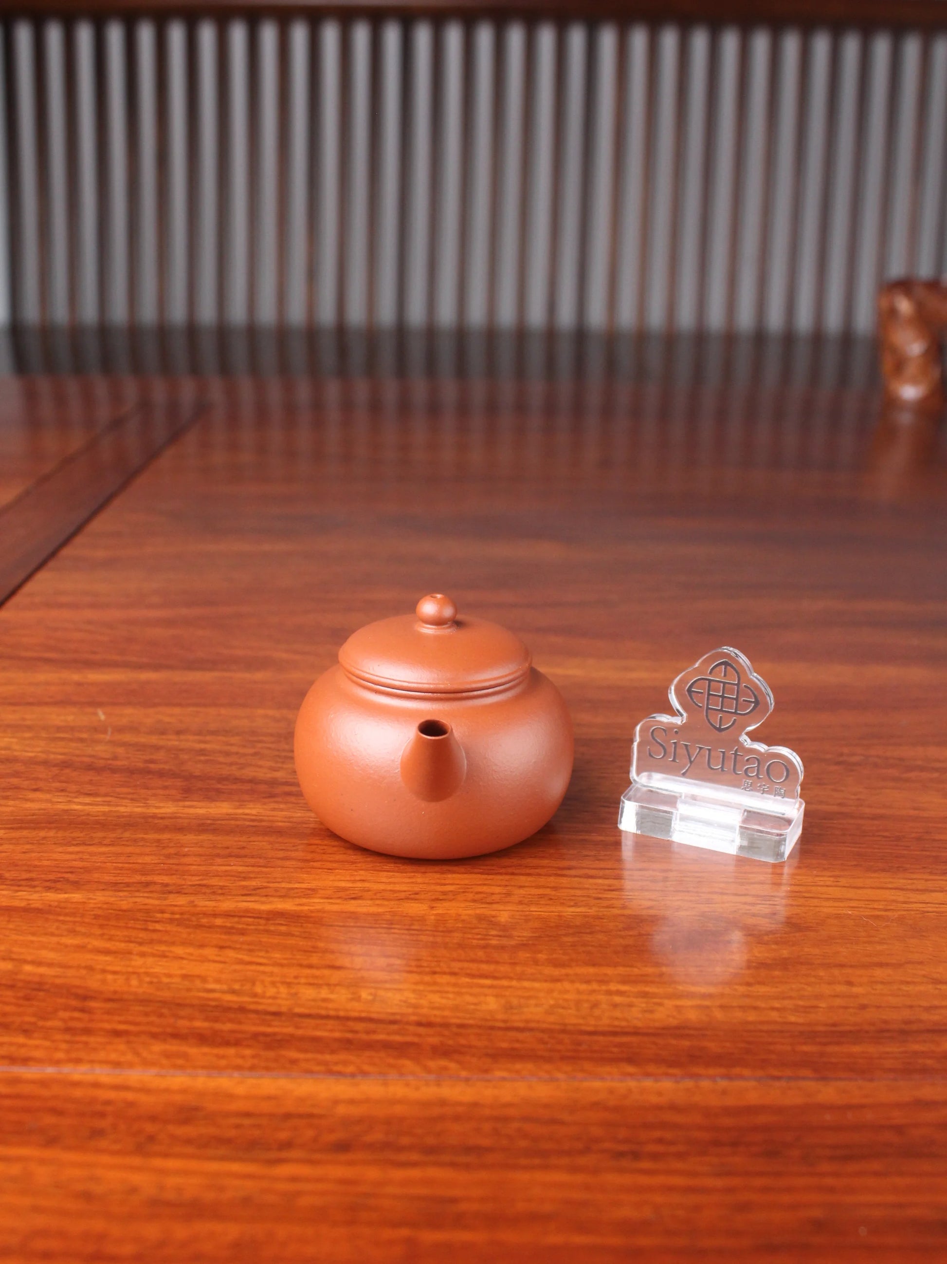 the front view of the handmade yixing teapot pao zun