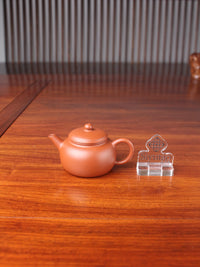 handmade yixing teapot pao zun on the table