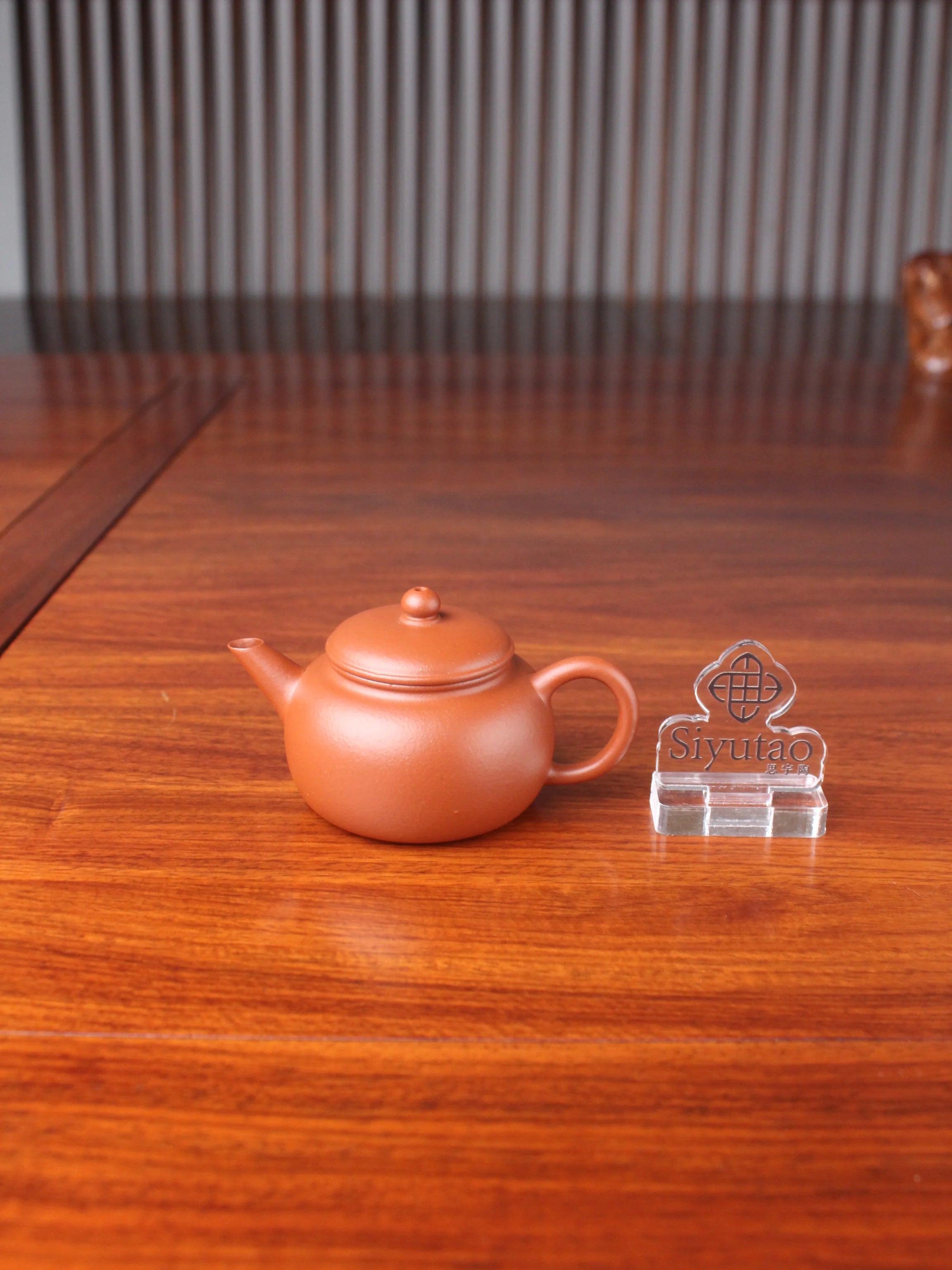 handmade yixing teapot pao zun on the table