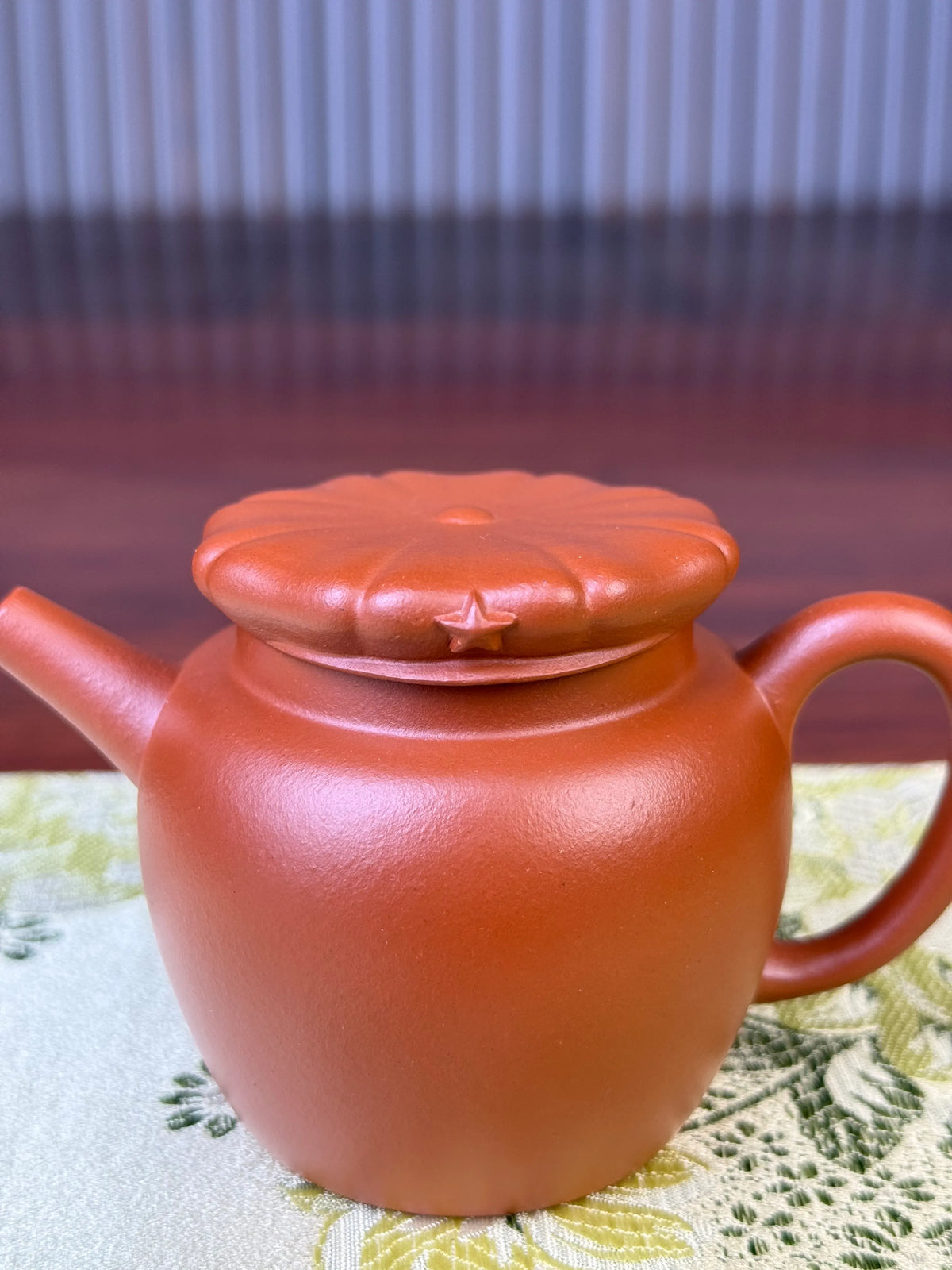 detail of handmade yixing teapot jun hat