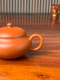the handle of the handmade yixing teapot yuan ju
