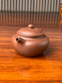 the right view of the handmade yixing teapot named yong fu lian zi