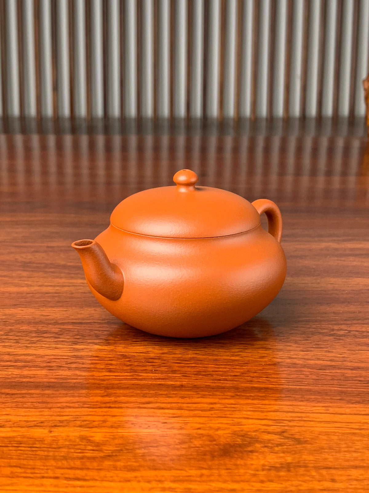 left view of handmade yixing teapot named yuan zhu 