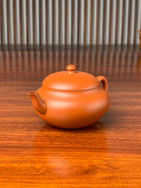 left view of handmade yixing teapot named yuan zhu 