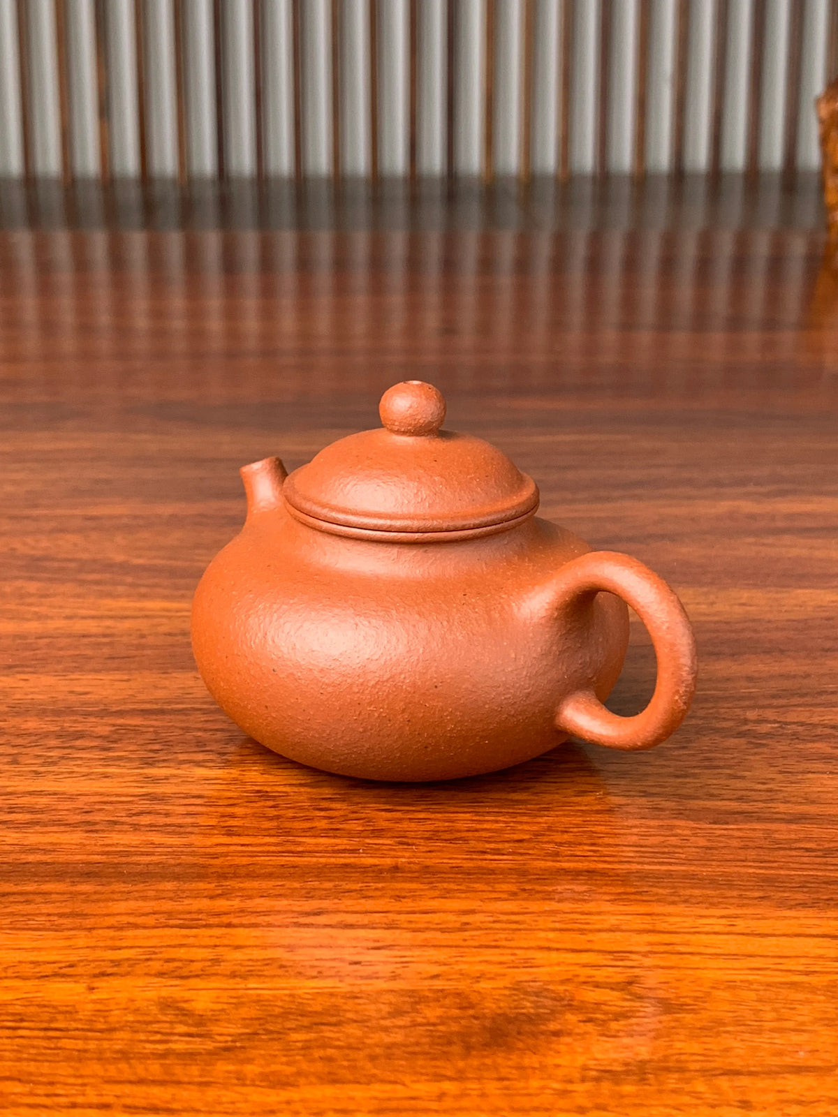 handmade yixing teapot rong tian on the table side view
