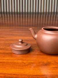 the lid and the spout of the handmade yixing teapot ping gai lian zi