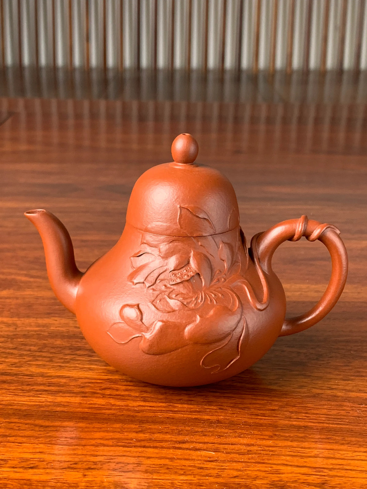 Take a closer look at the lotus paintings on this Yixing teapot