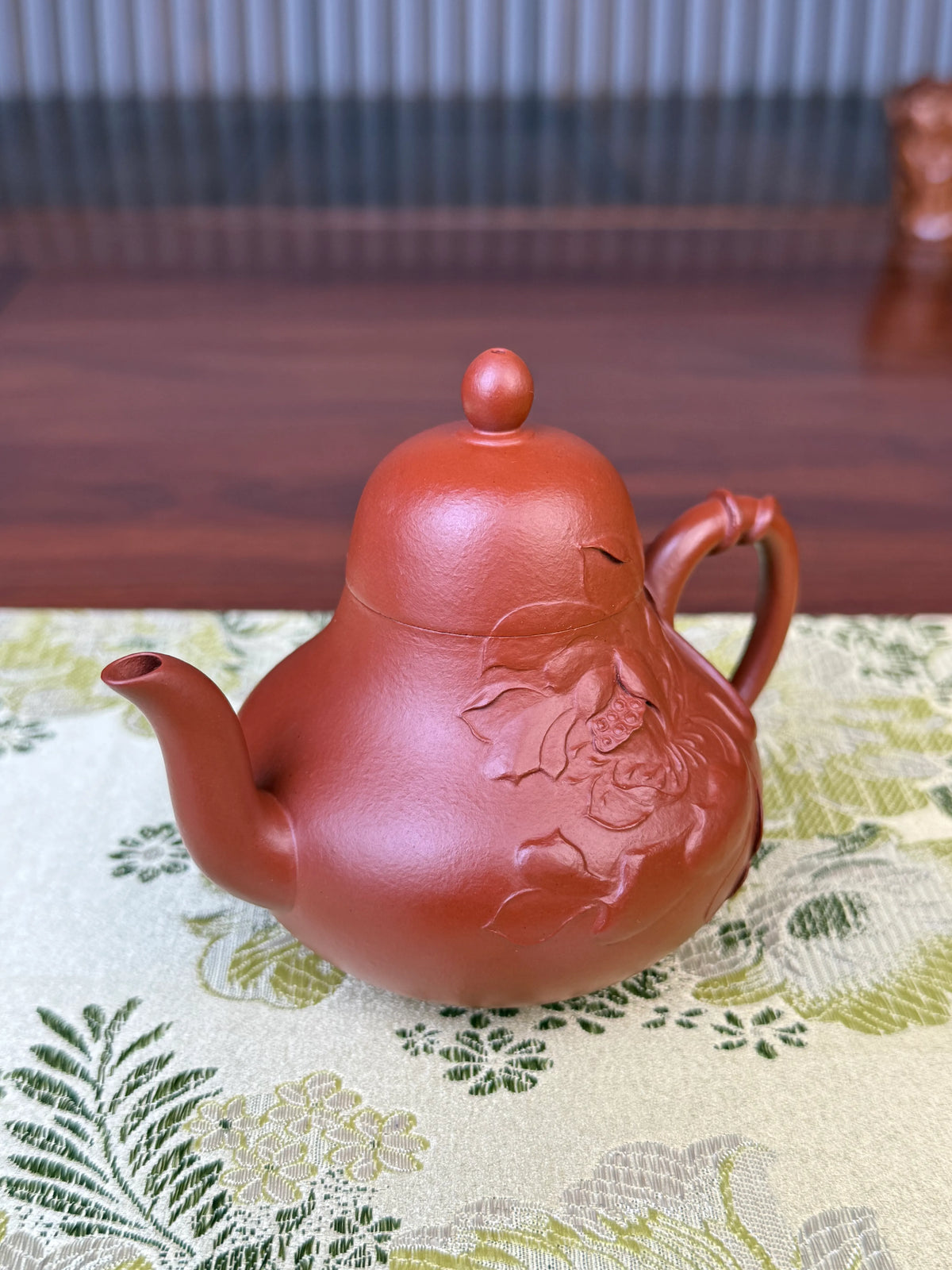 Take a closer look at the lotus paintings on this Yixing teapot