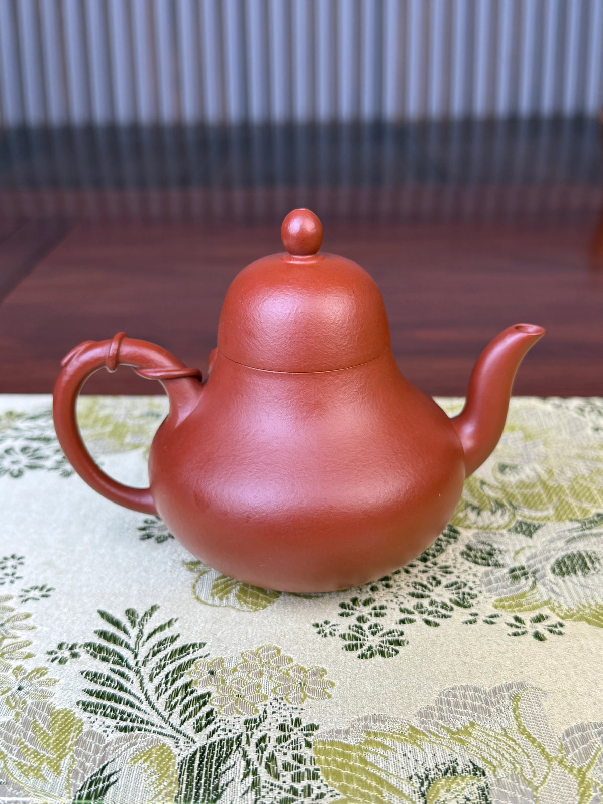 back view of the handmade yixing clay teapot named si ting