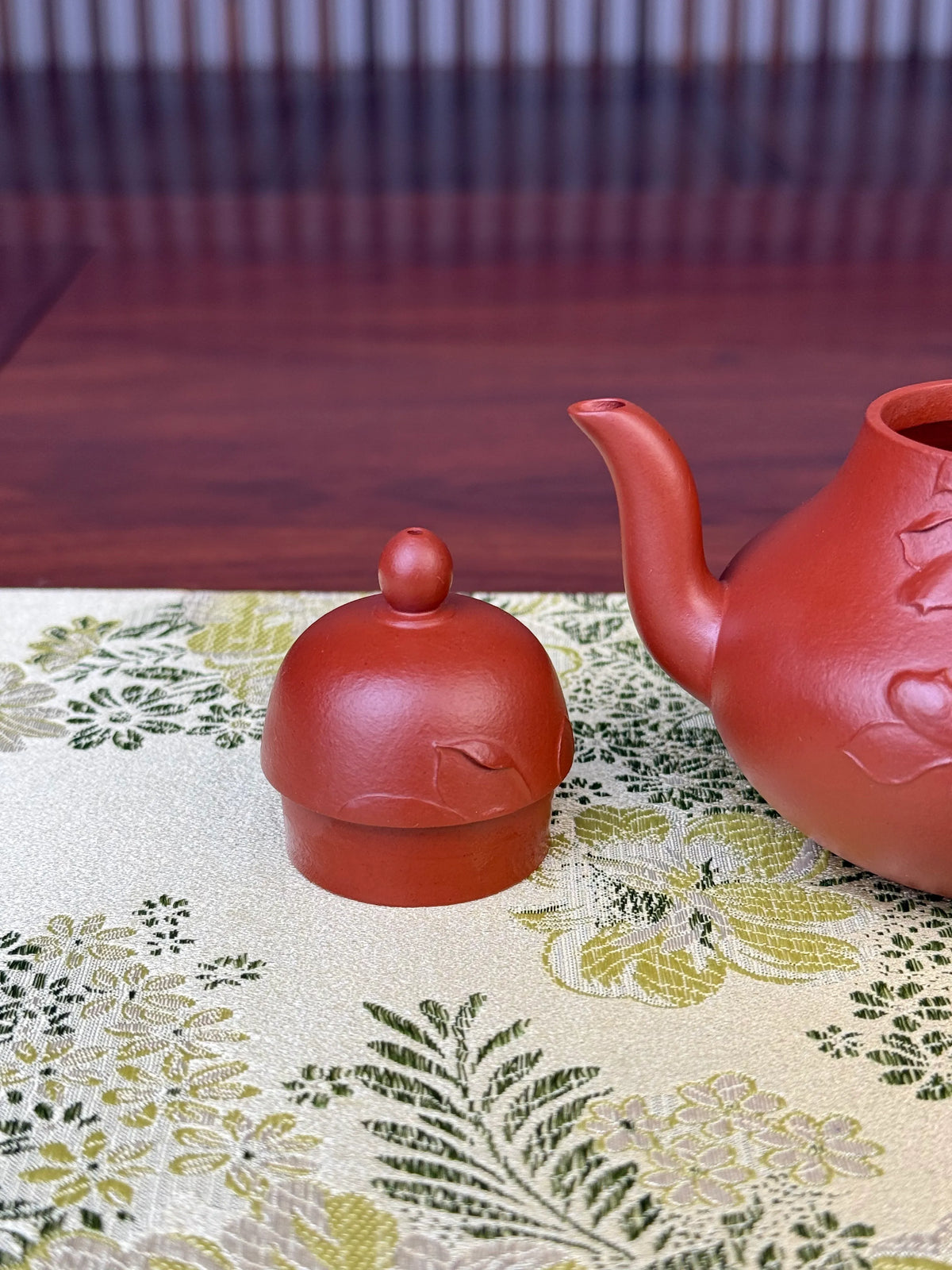 the lid and the spout of the handmade zisha clay teapot named si ting