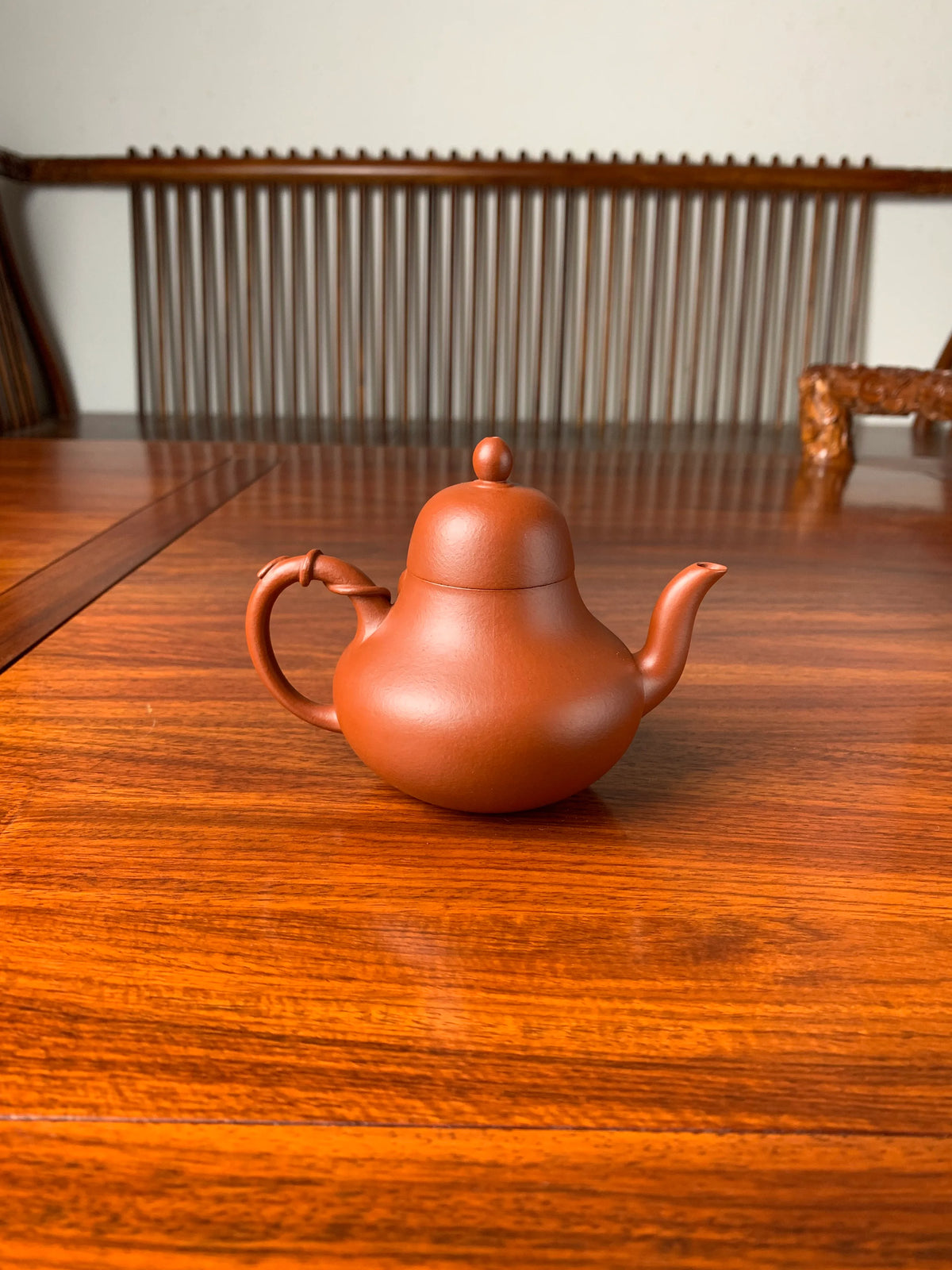 back view of the handmade yixing clay teapot named si ting