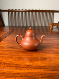 back view of the handmade yixing clay teapot named si ting