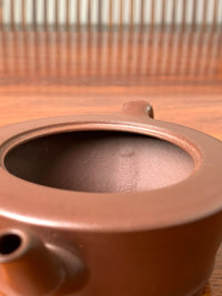 The hand-finished seam marks visible inside the teapot, evidence of its fully handmade craftsmanship