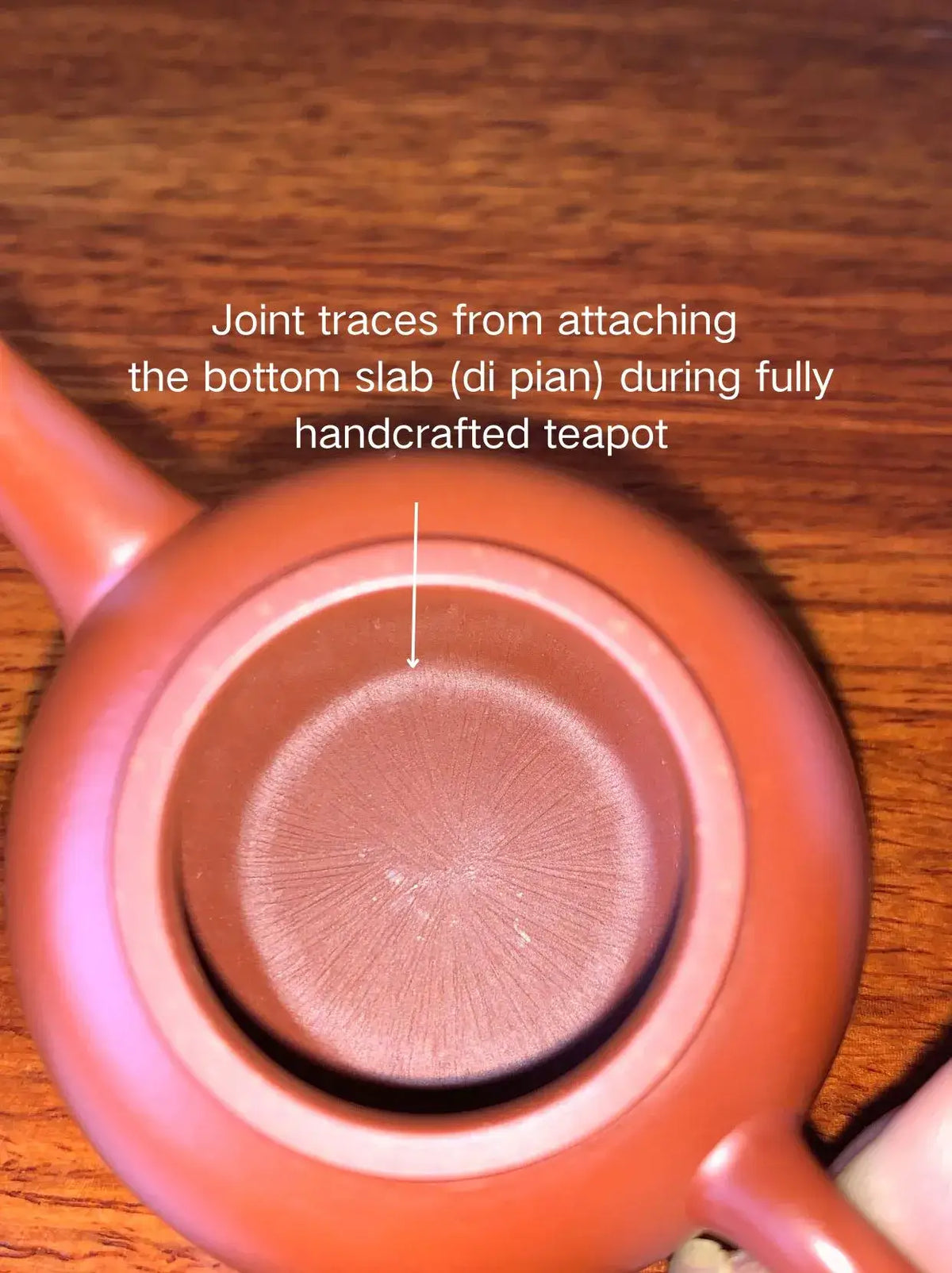 Joint traces from attaching the bottom slab (di pian) during fully handcrafted teapot
