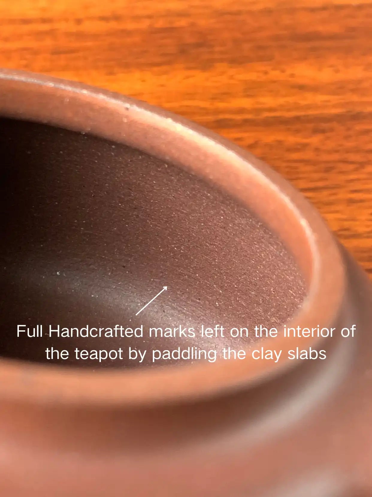 Full Handcrafted marks left on the interior of the teapot by paddling the clay slabs