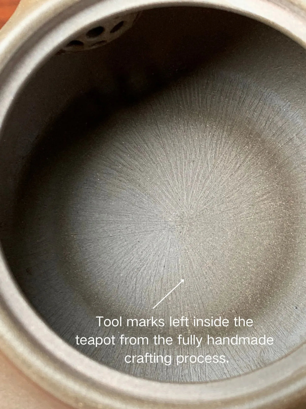 Tool marks left inside the teapot from the fully handmade crafting process