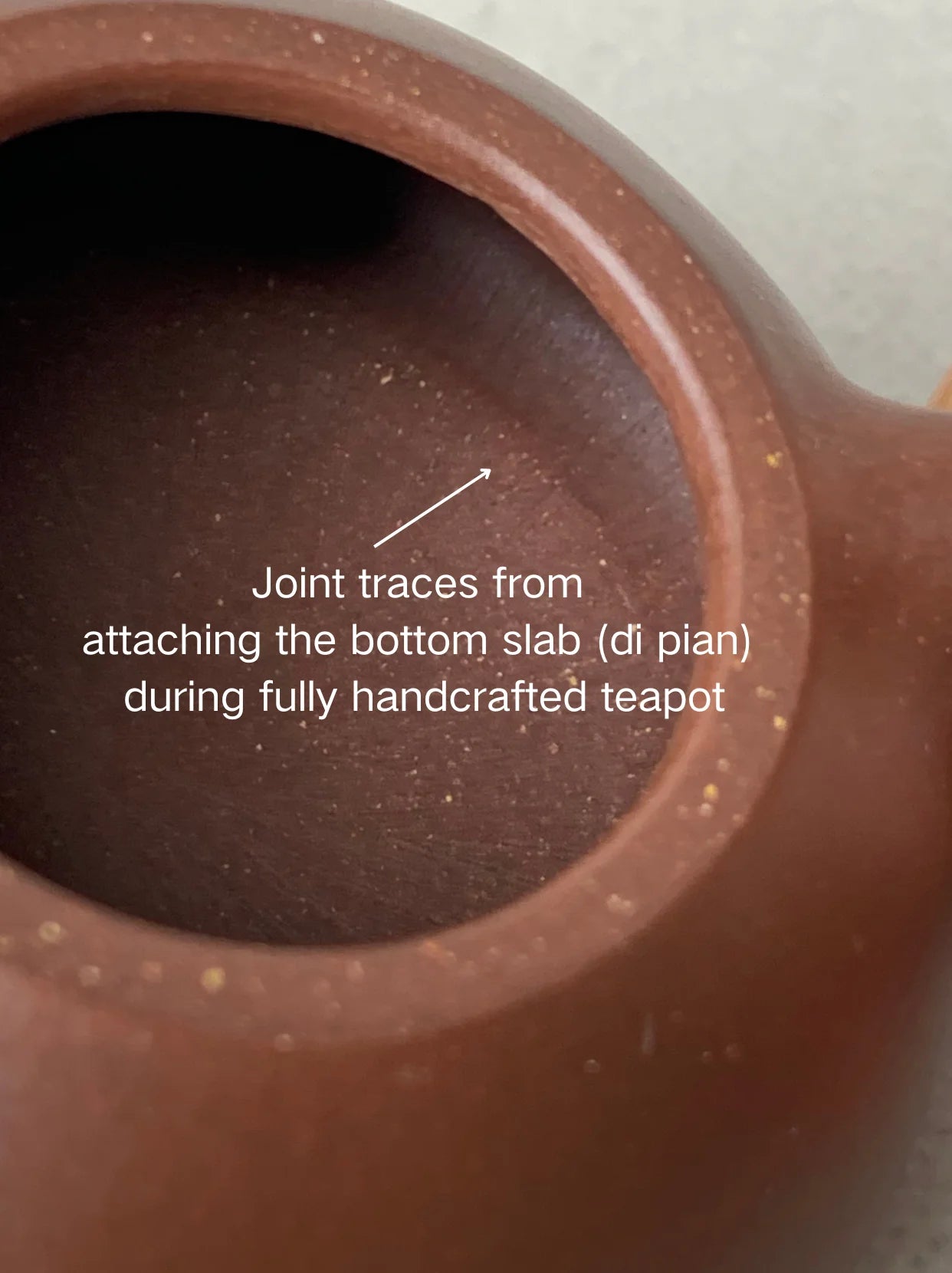 Joint traces from attaching the bottom slab (di pian) during fully handcrafted teapot