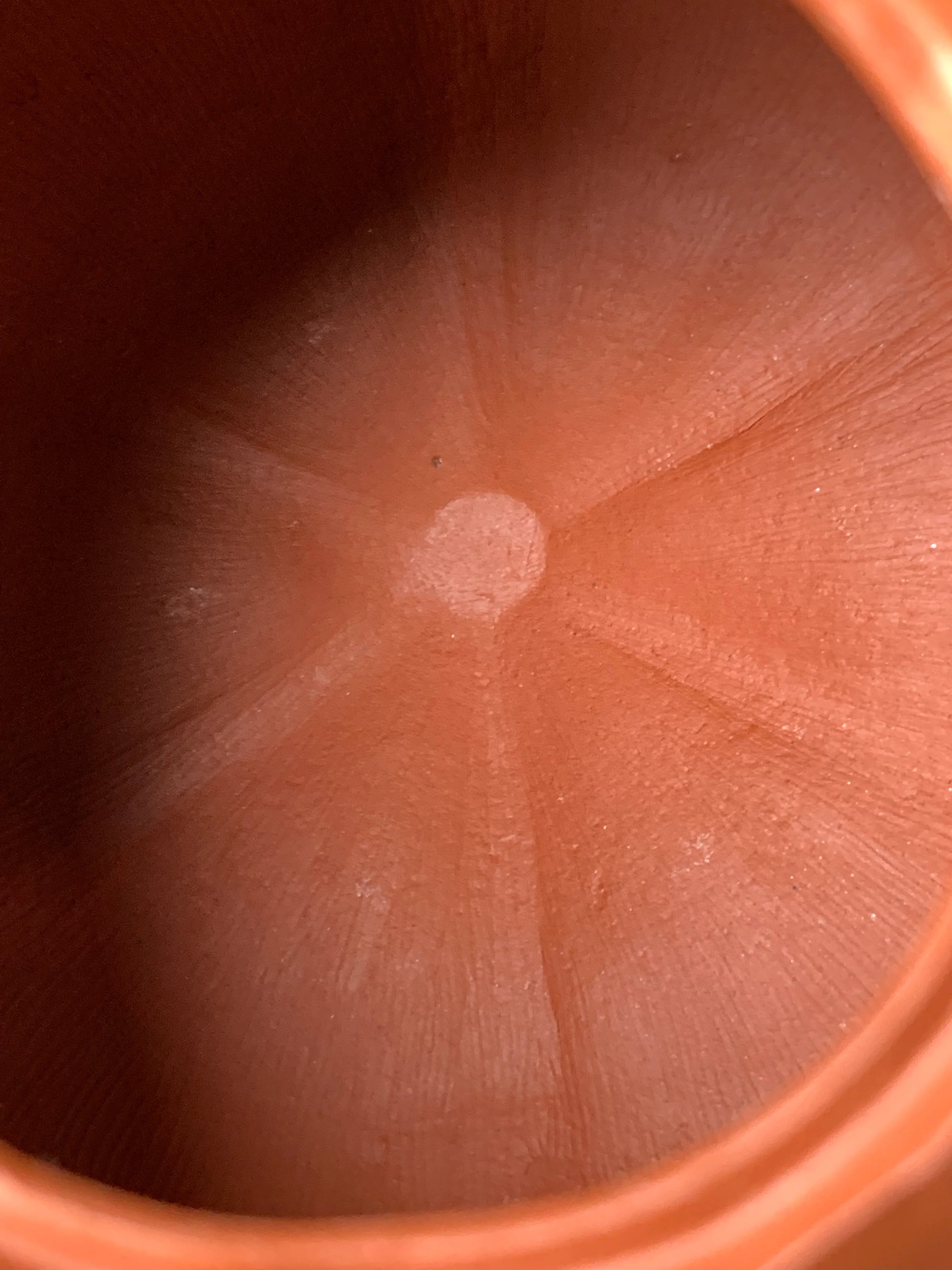 Traces of hand tools on the bottom of the inside of the teapot