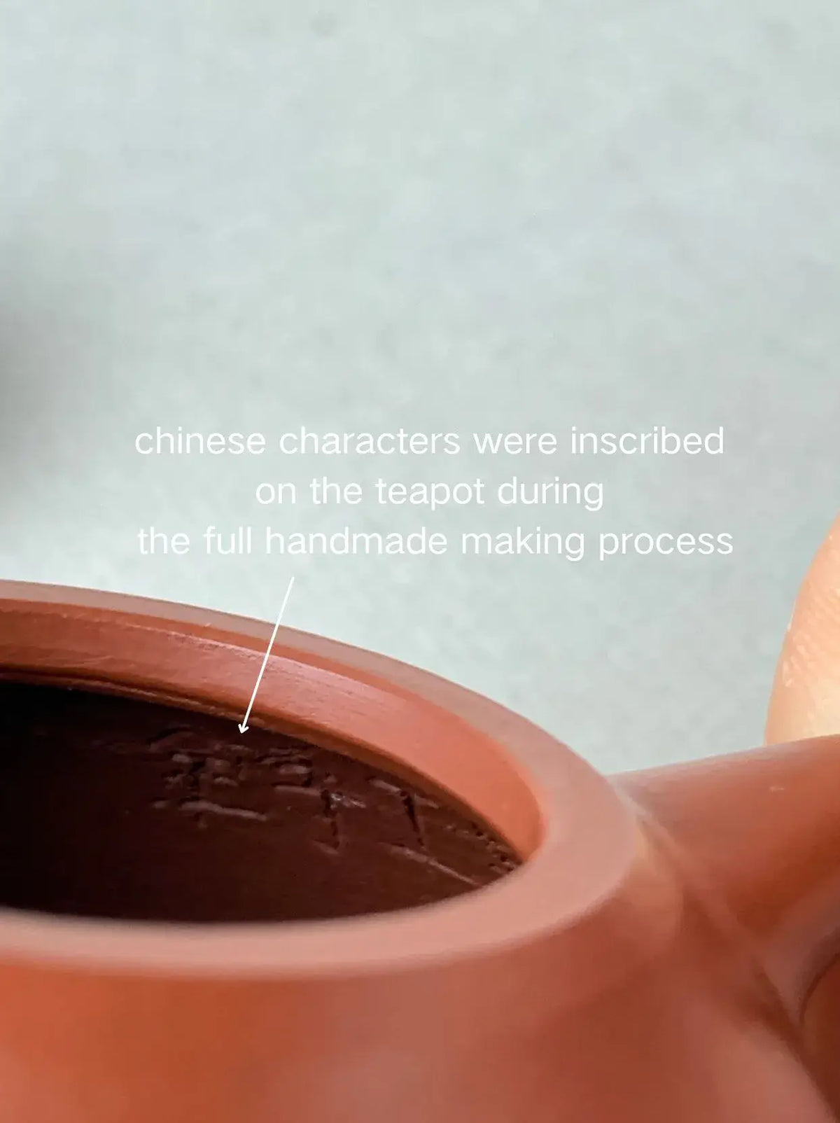 the inside characters in the full handmade teapot