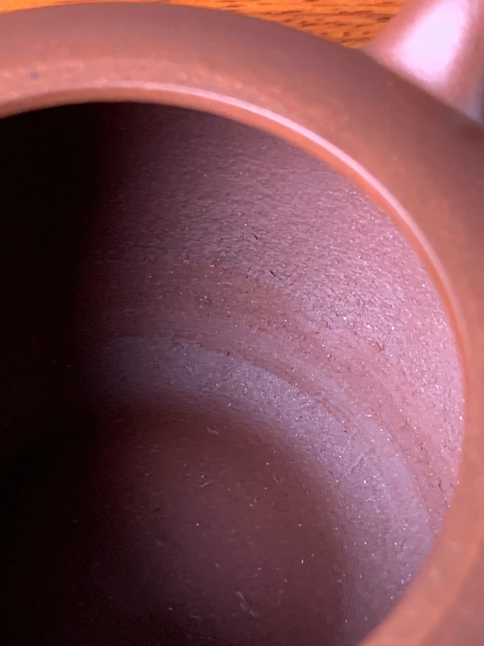 fully handmade, leaving tool marks on the interior of the teapot