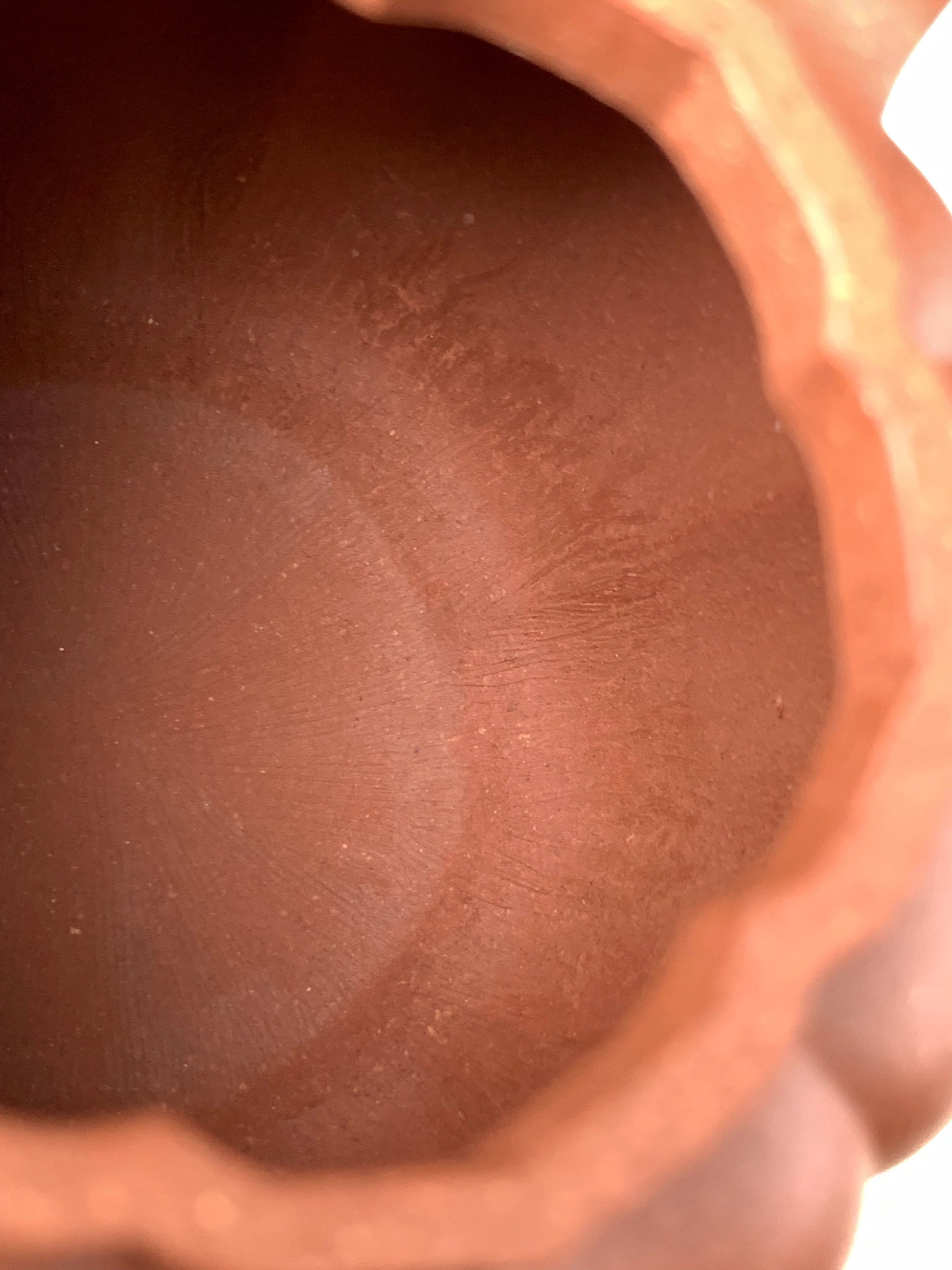 The tools used in handmade teapots have left marks on the inside.