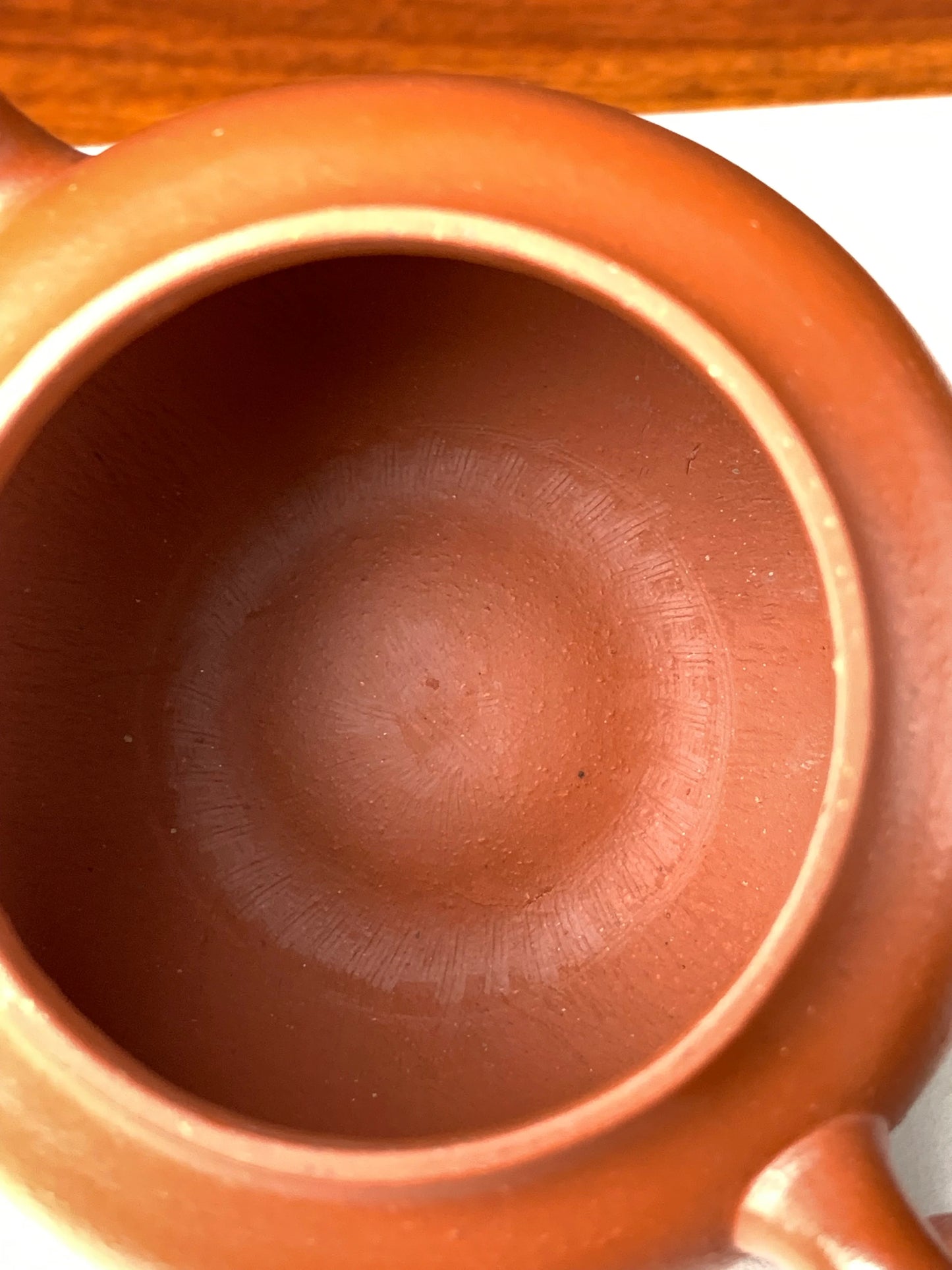The interior of the teapot bears traces left by the fully handmade process
