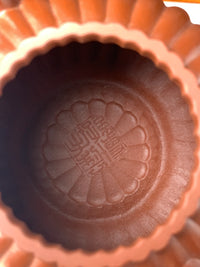 A photo of the inner wall seal of the Yixing teapot.