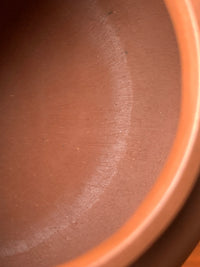Traces of tools left on the inner surface of the teapot during handcrafting