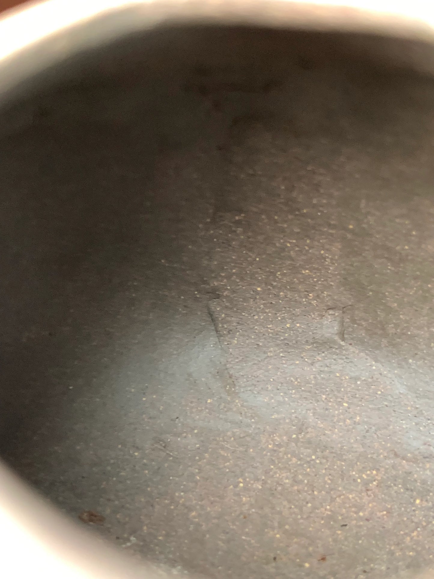 The tool marks and fingerprints left inside the fully handmade teapot