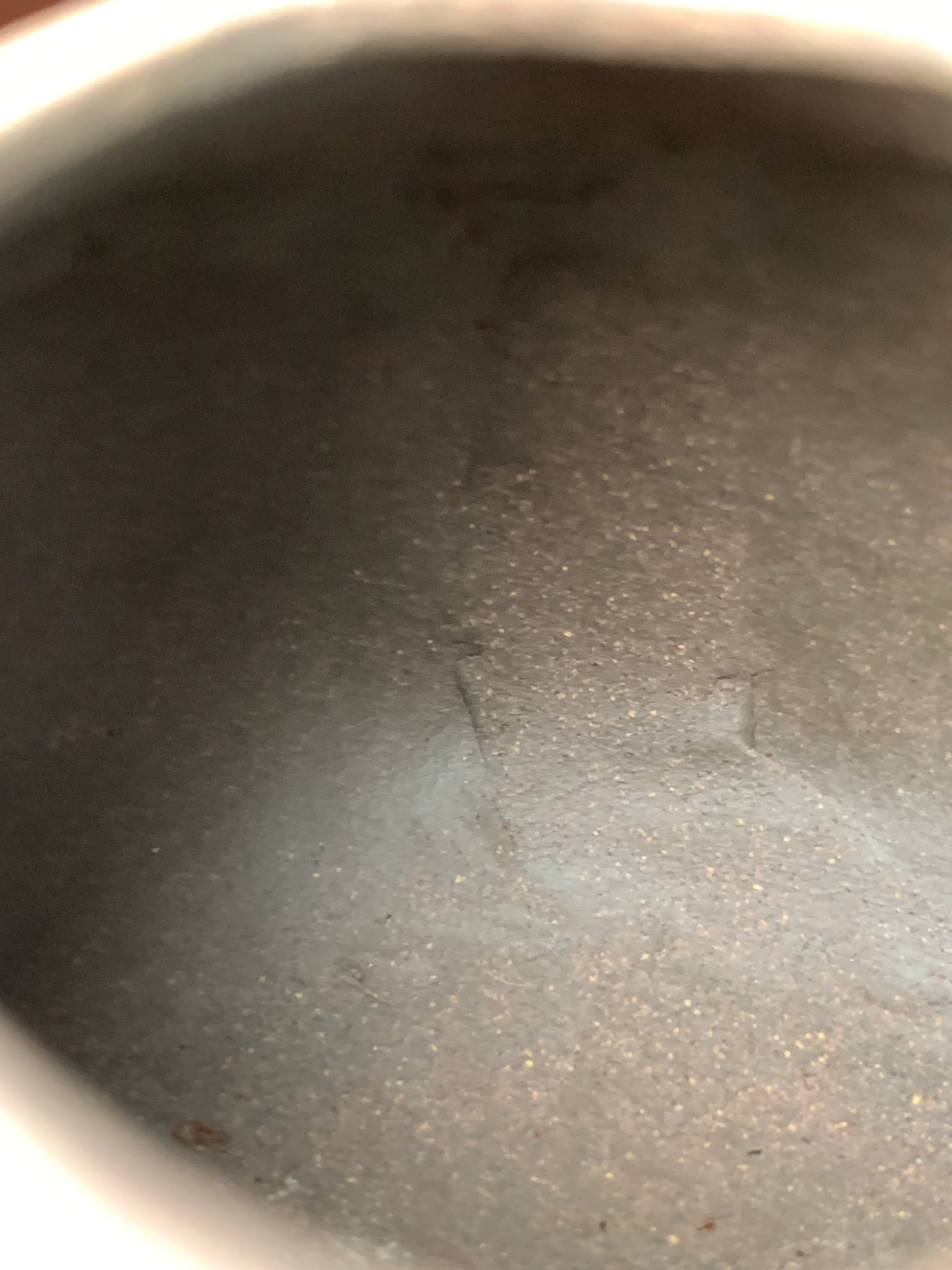 The tool marks and fingerprints left inside the fully handmade teapot