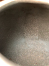 The tool marks and fingerprints left inside the fully handmade teapot