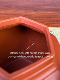 interior seal left on the inner wall during full-handmade teapot making