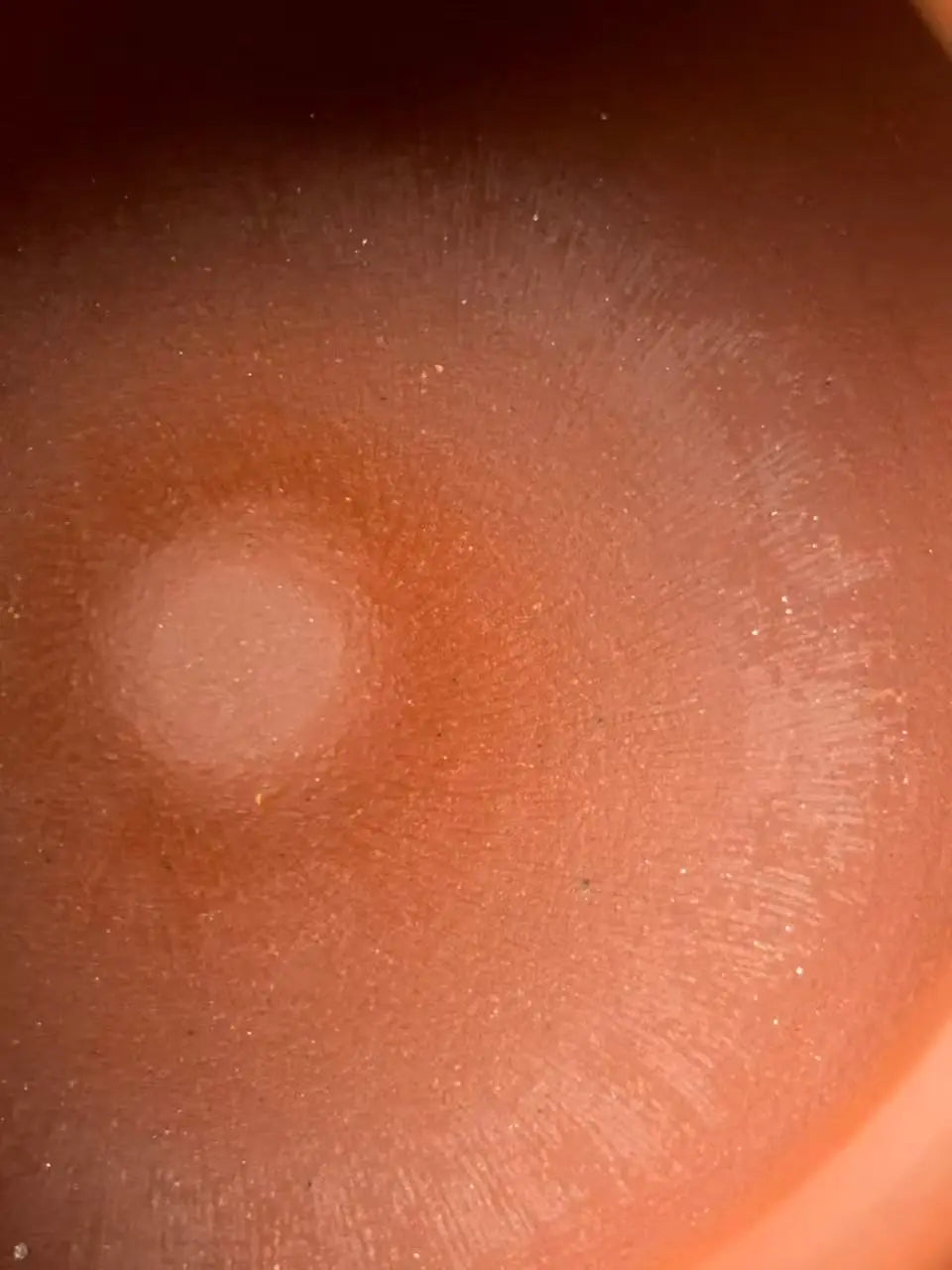 The tool marks left by the full handmade teapot