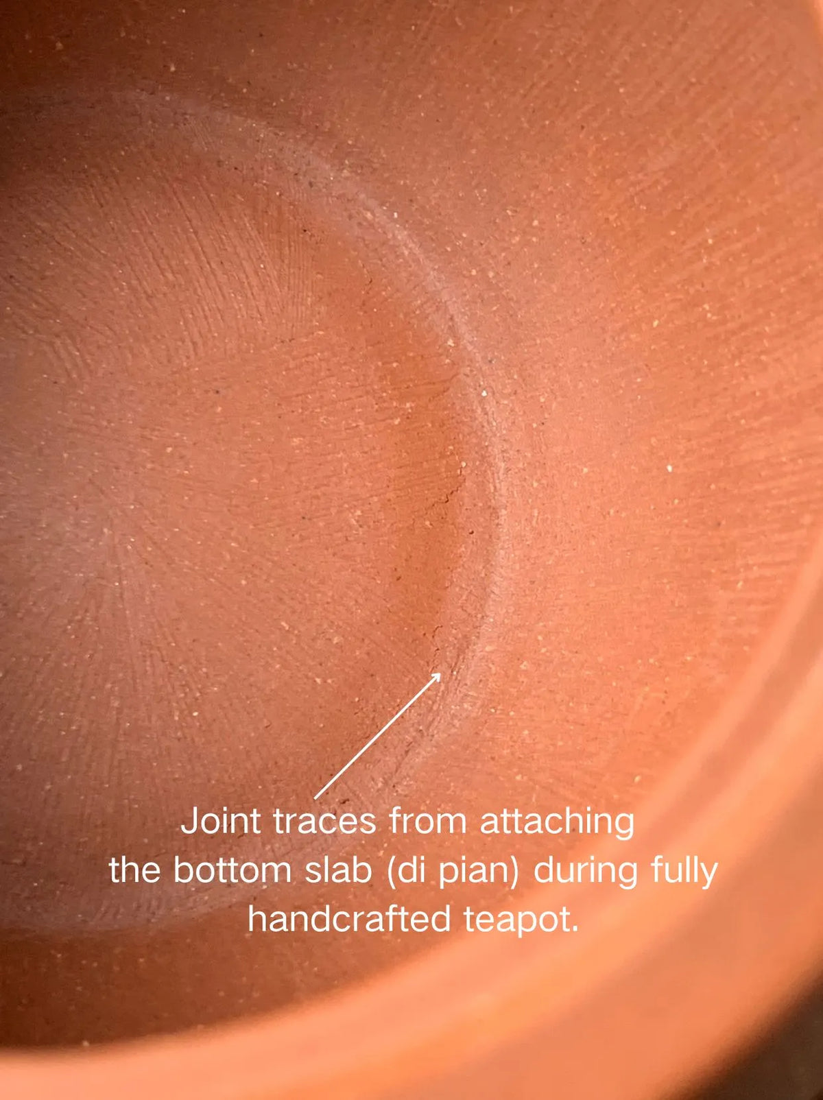 Joint traces from attaching the bottom slab (di pian) during fully handcrafted teapot