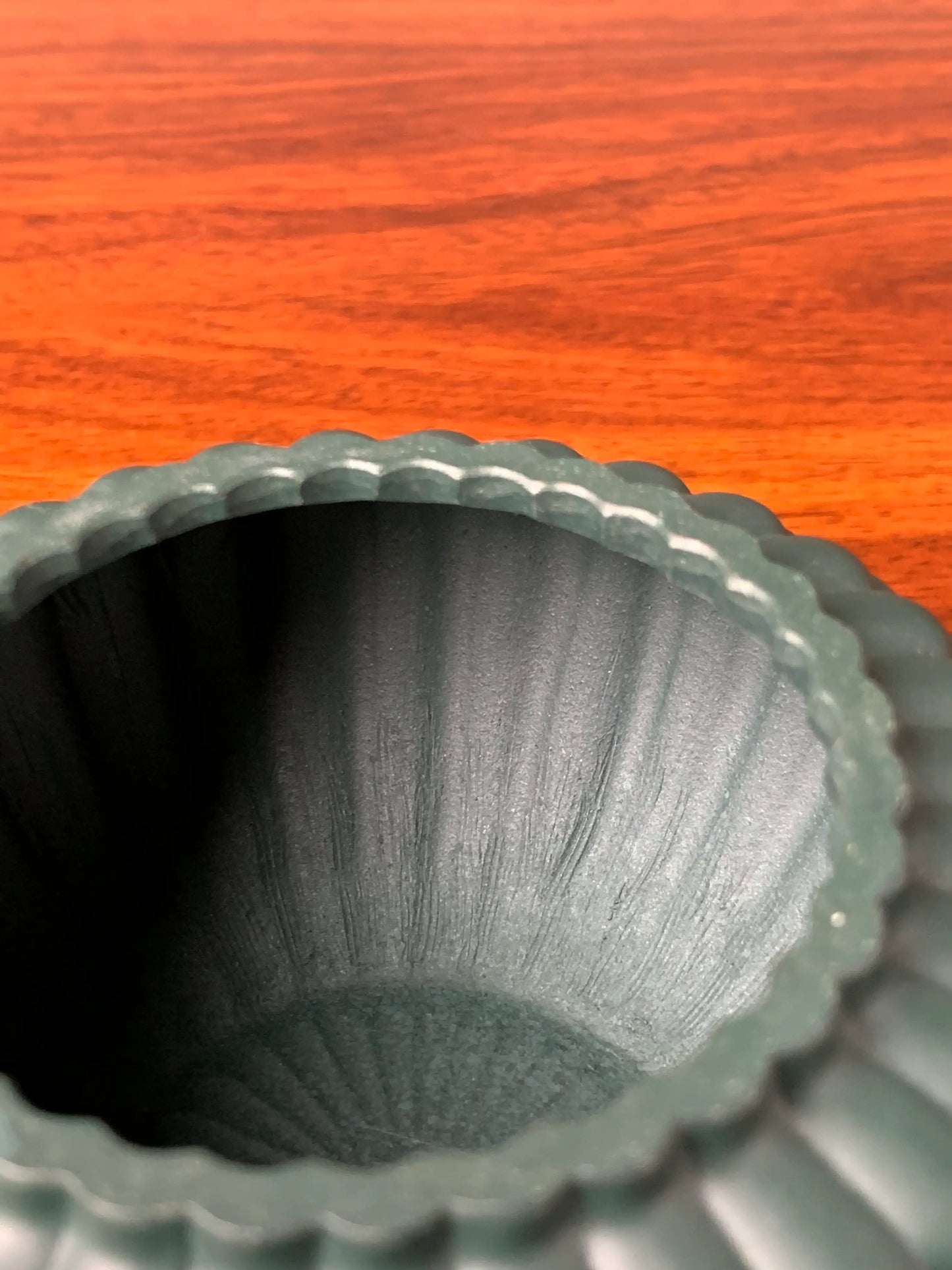 The tool marks left on the interior of the teapot after it was full handmade