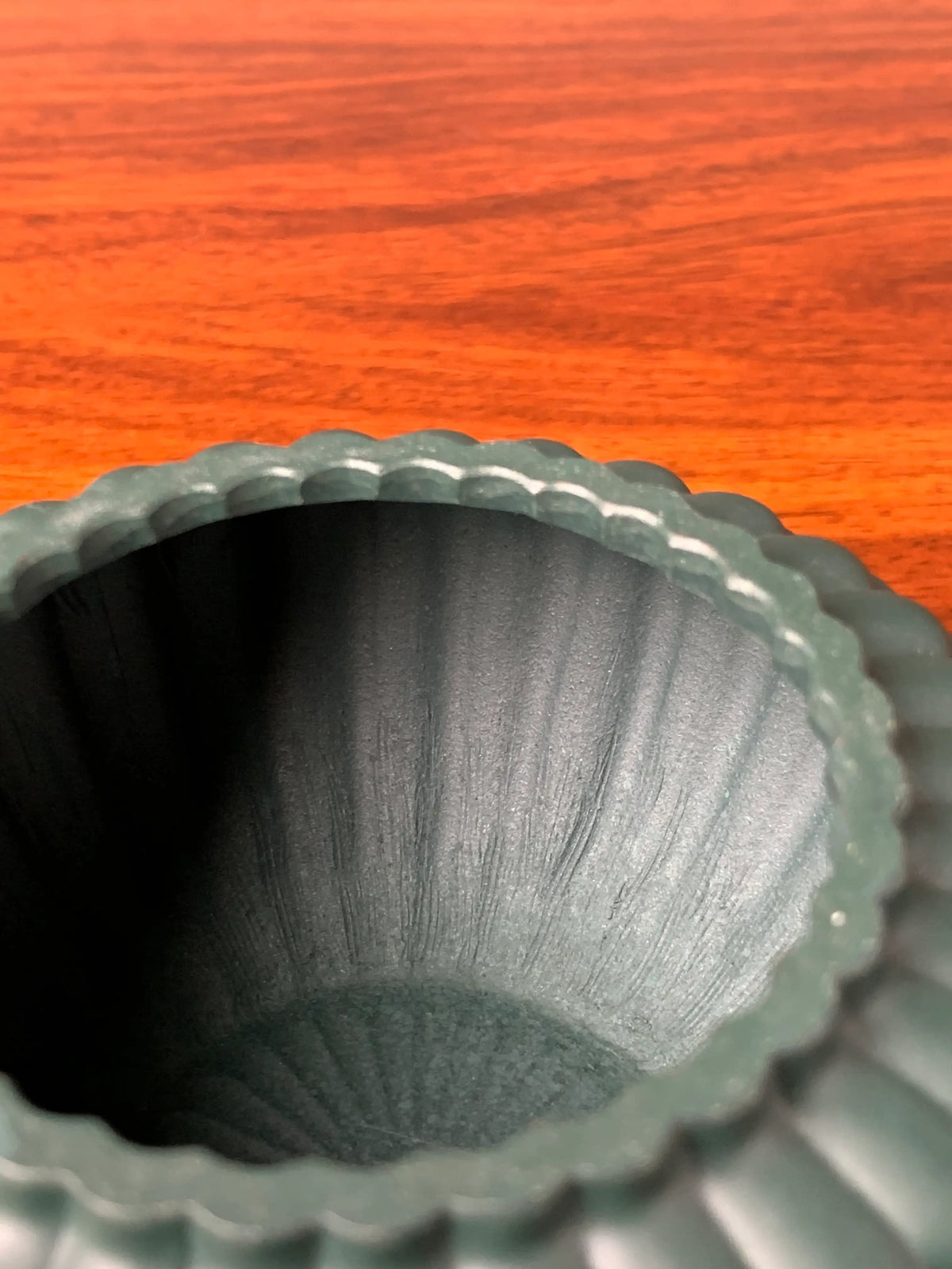 The tool marks left on the interior of the teapot after it was full handmade