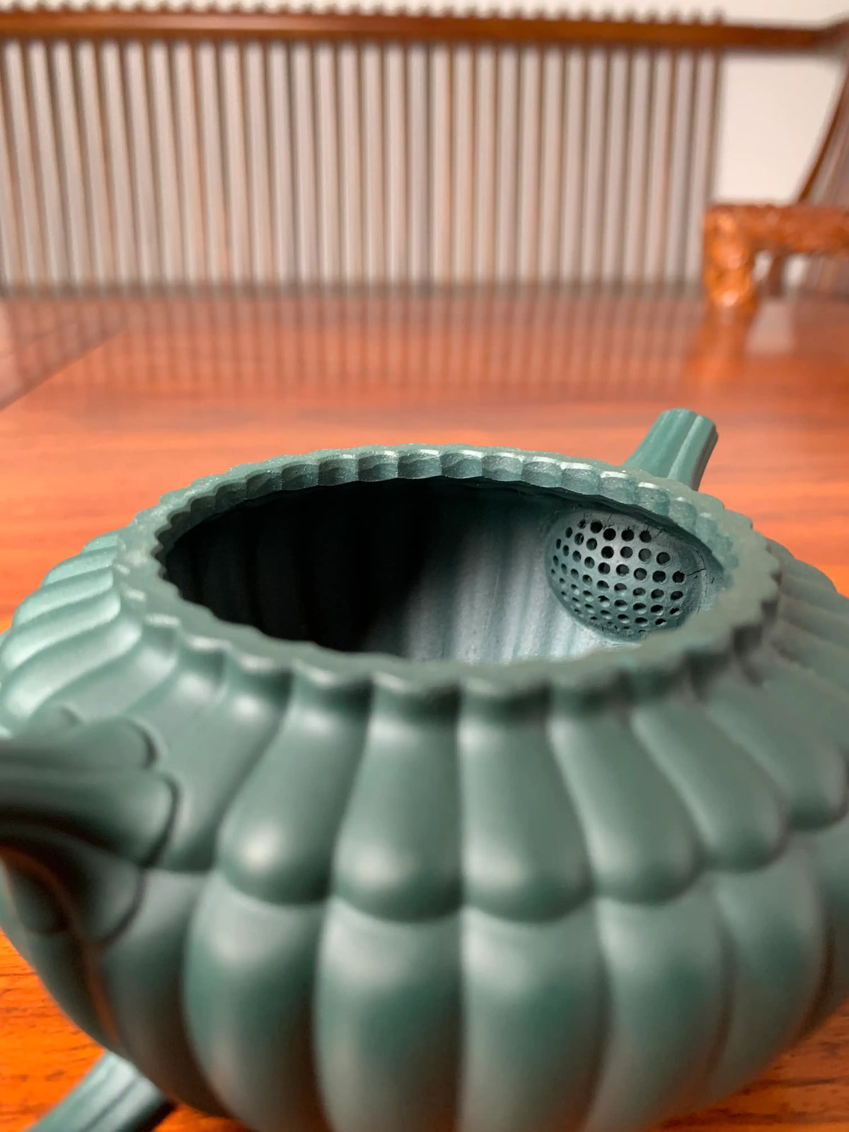 Close up view of teapot zisha yun bian's filter