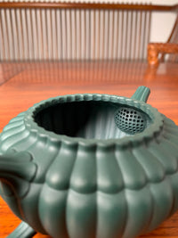 Close up view of teapot zisha yun bian's filter