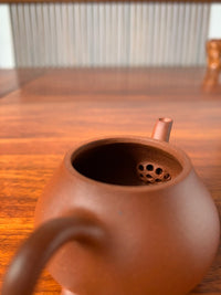 View of the teapot's ball filter from a distance