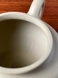 The seams left inside after full handmaking the teapot 