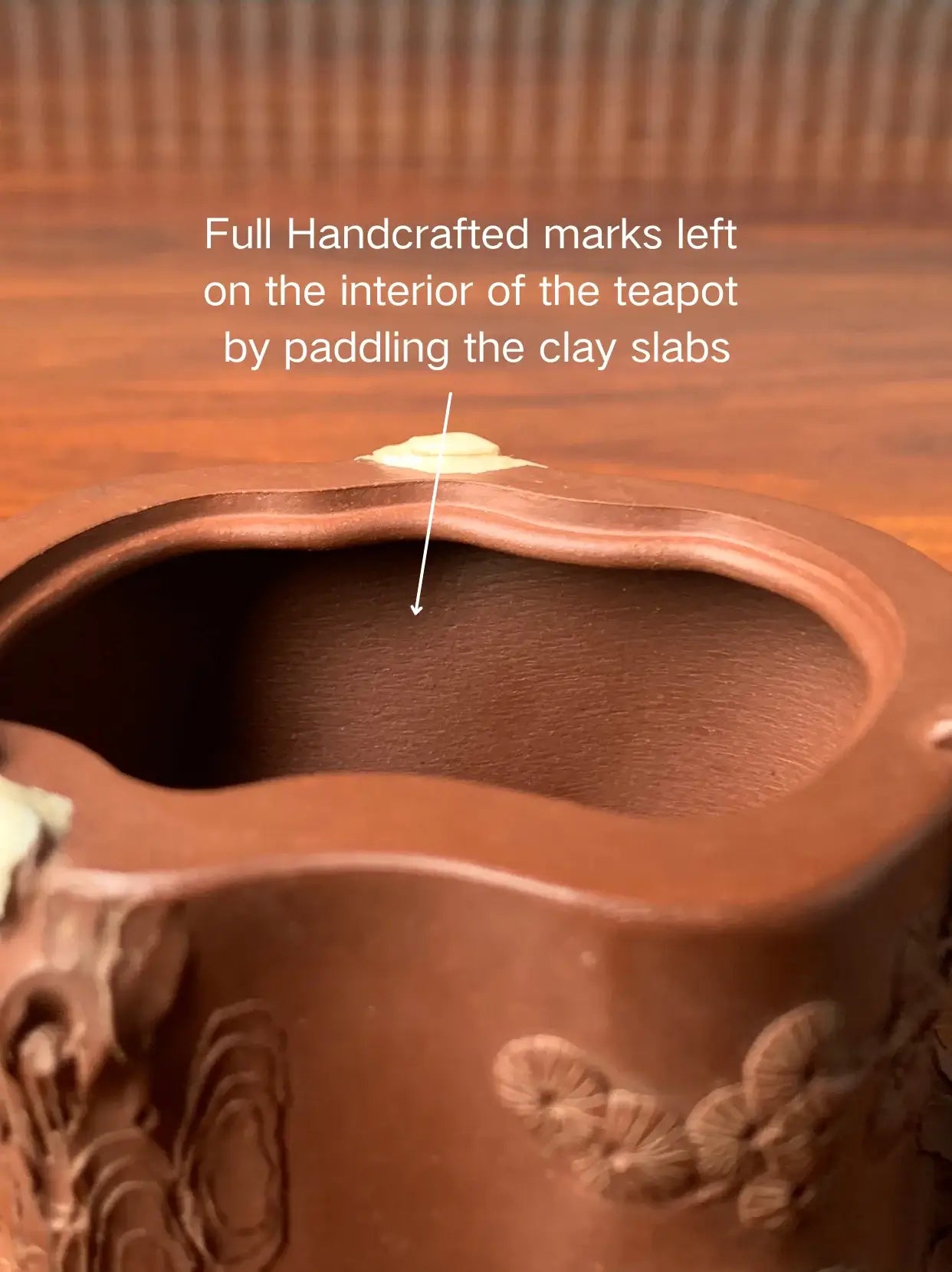 full handmade marks left on the interior of the teapot