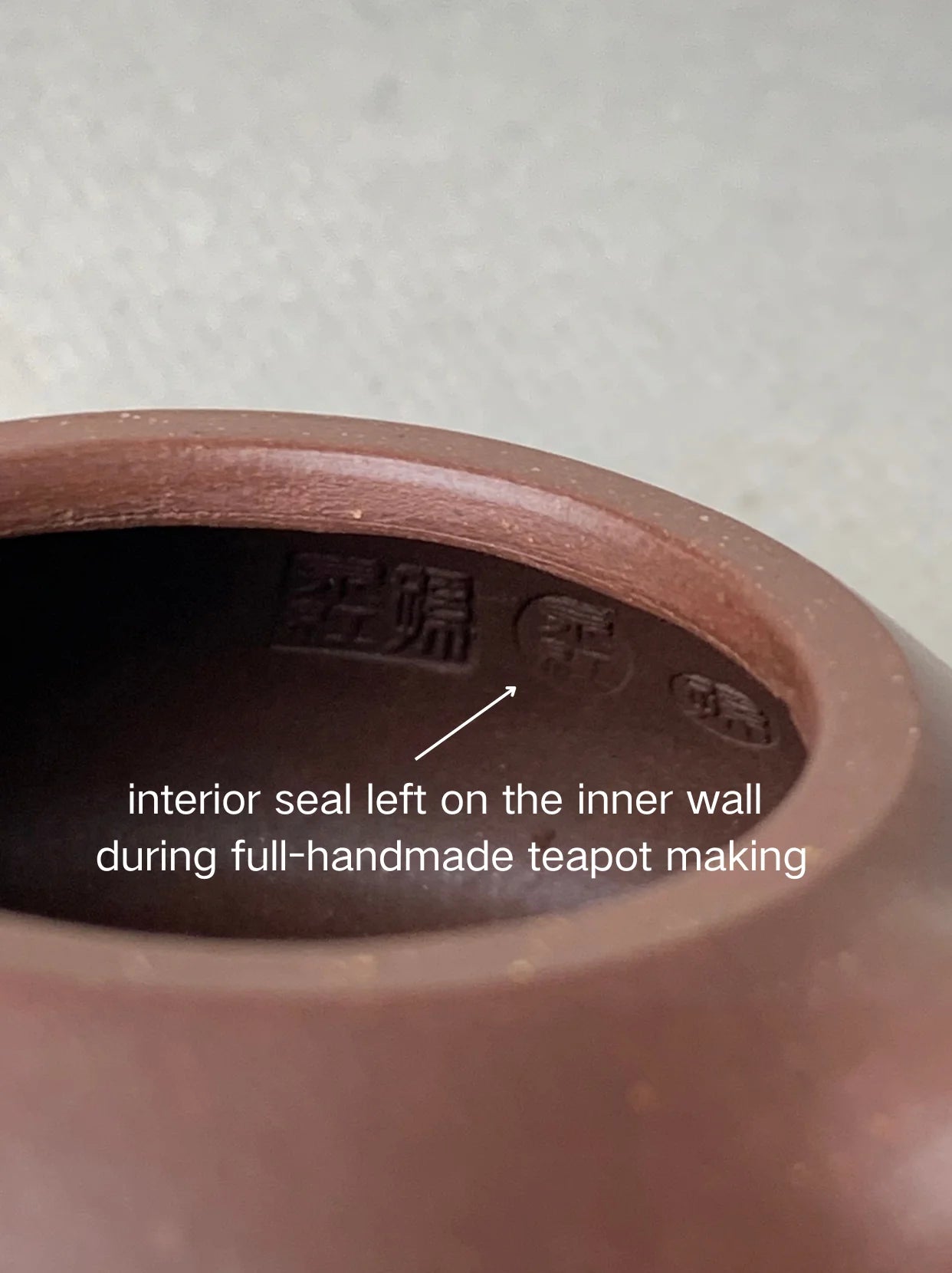interior seal left on the inner wall during full-handmade teapot making