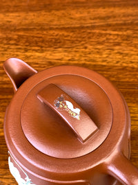knob of the beautiful teapot
