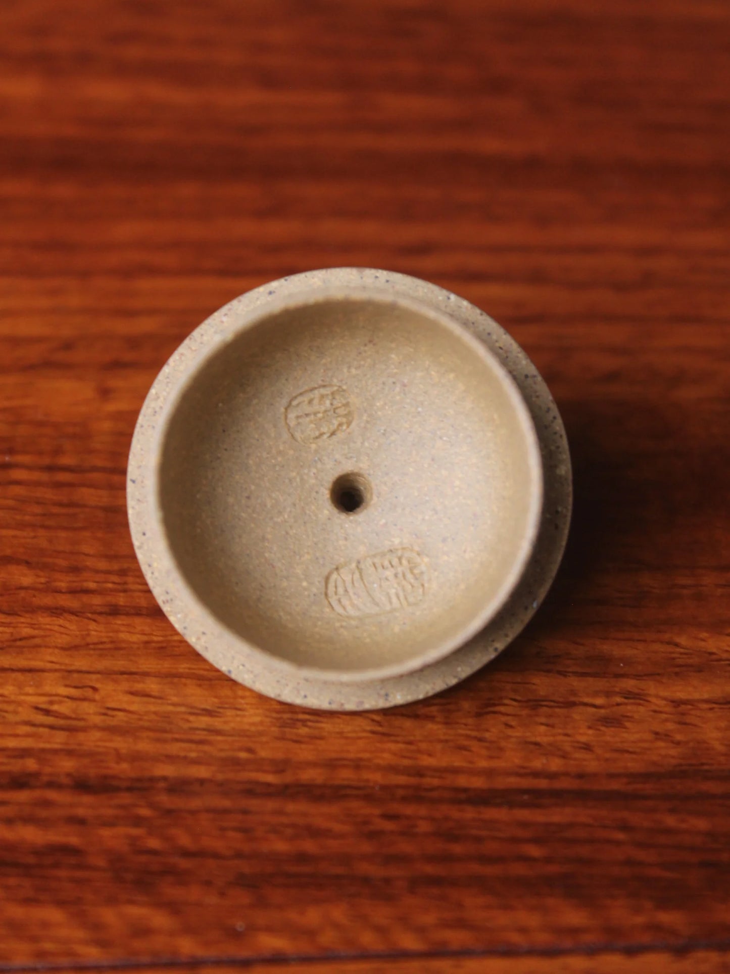 the two teapot marks in the lid of yixing teapot named gongchun