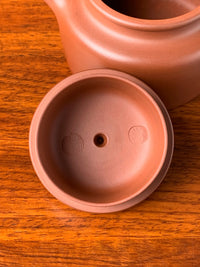 Details of the inside of the lid of the collectible teapot