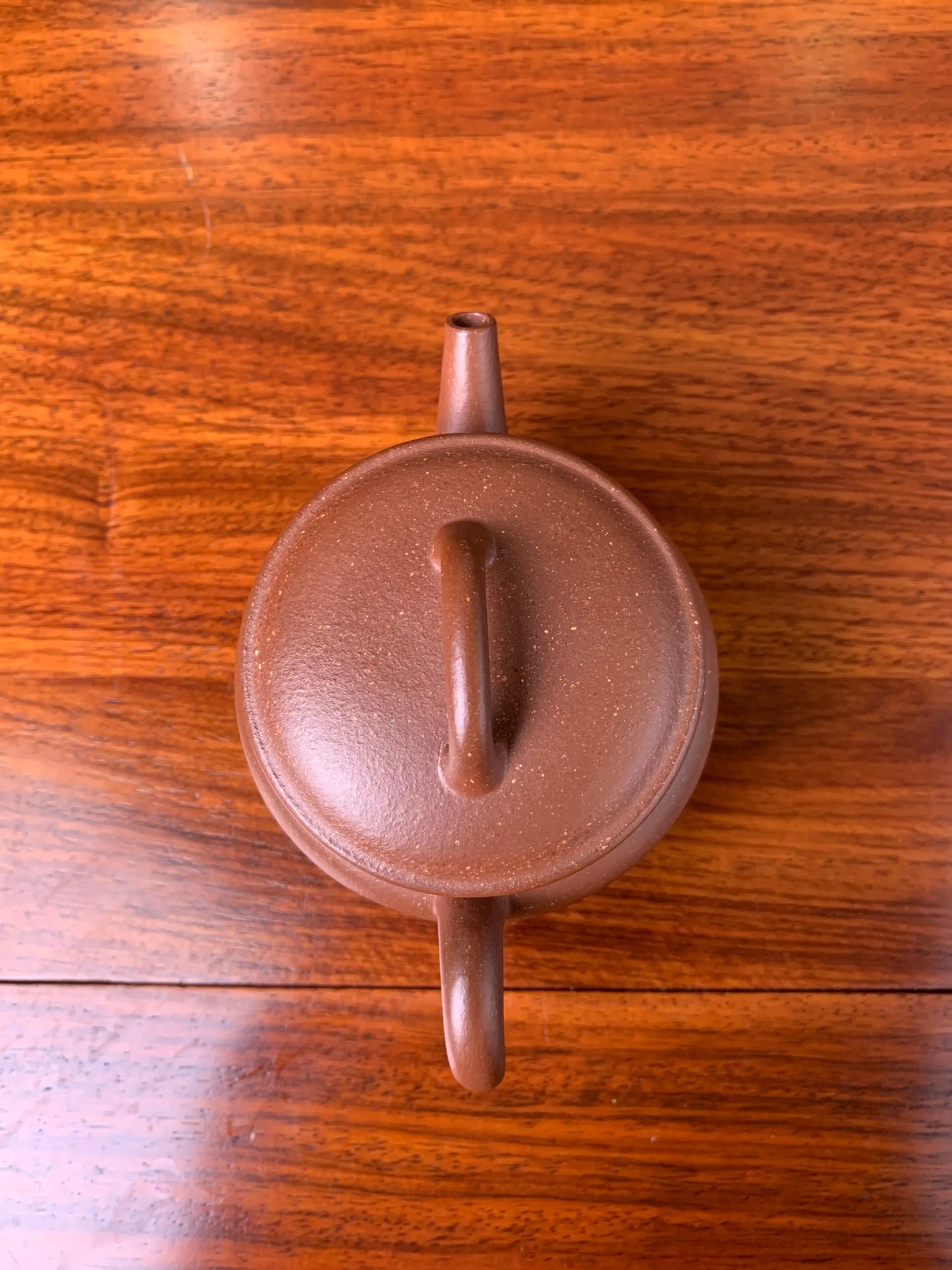 Looking down at this teapot from a close distance