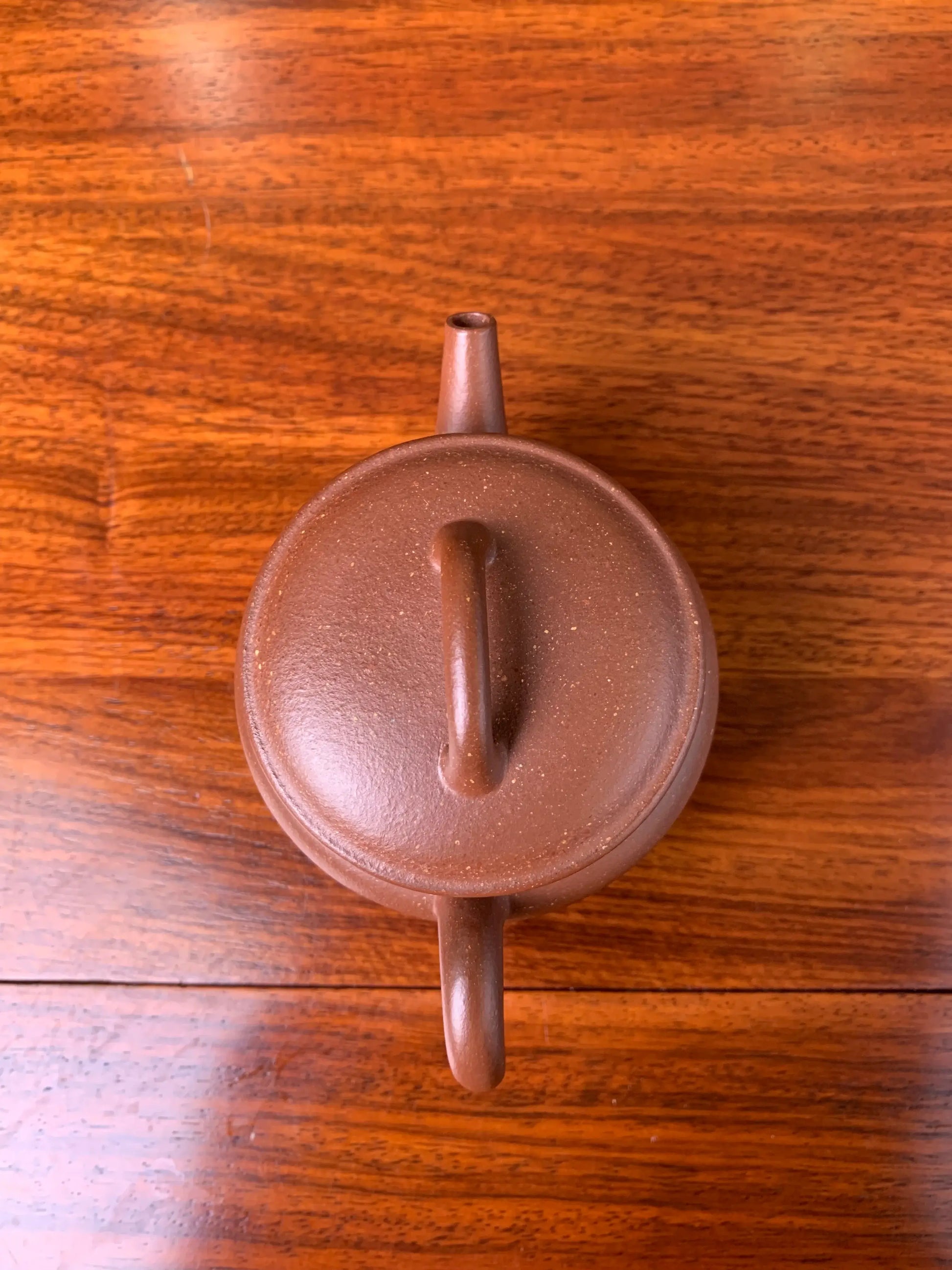 Looking down at this teapot from a close distance