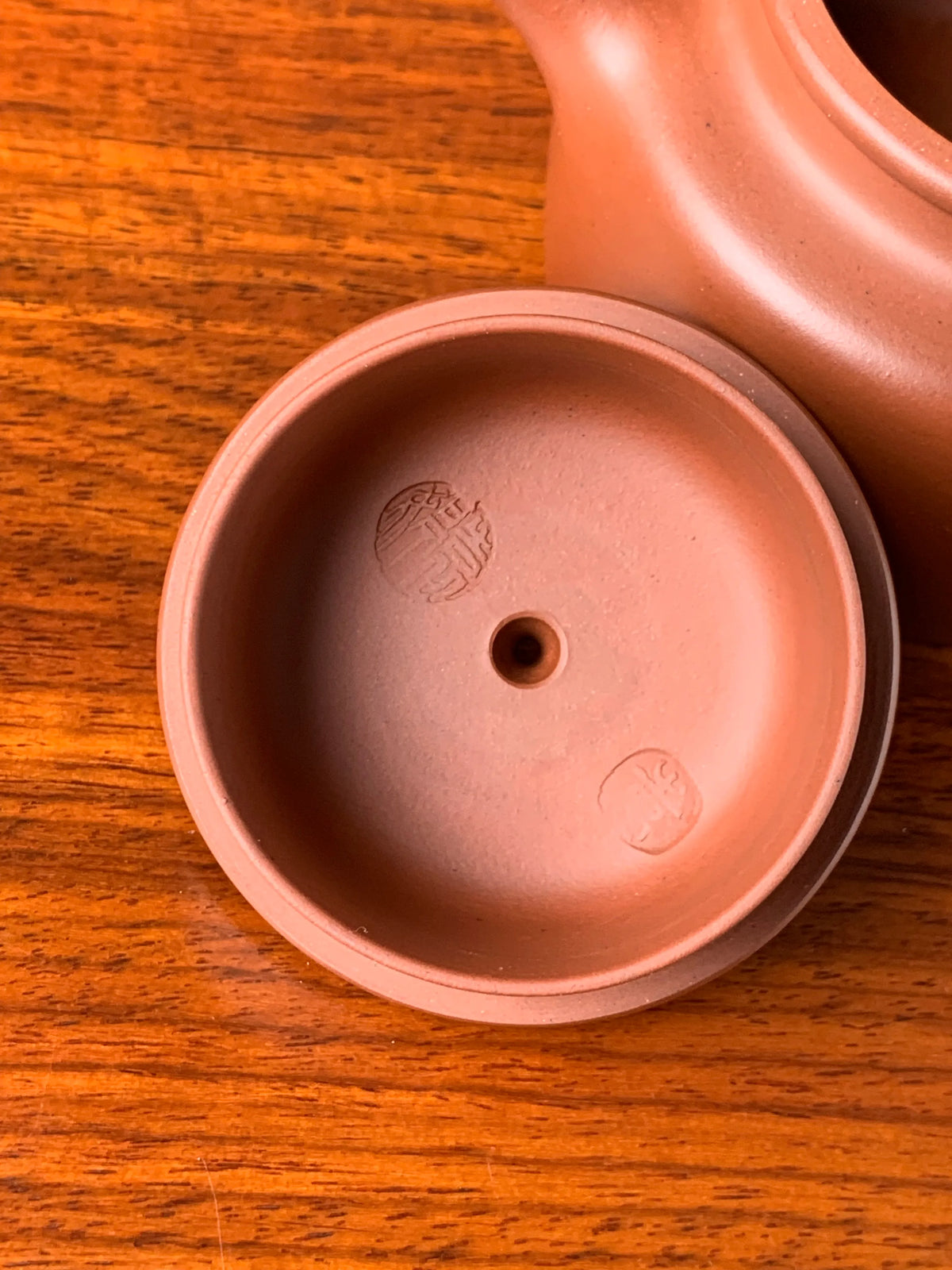Detail of the inside of the lid of a collectible teapot