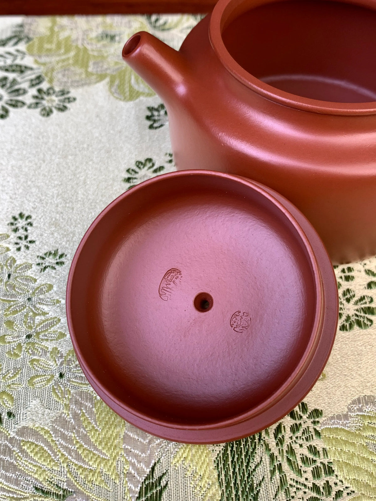 two yixing teapot marks of the artist in the lid